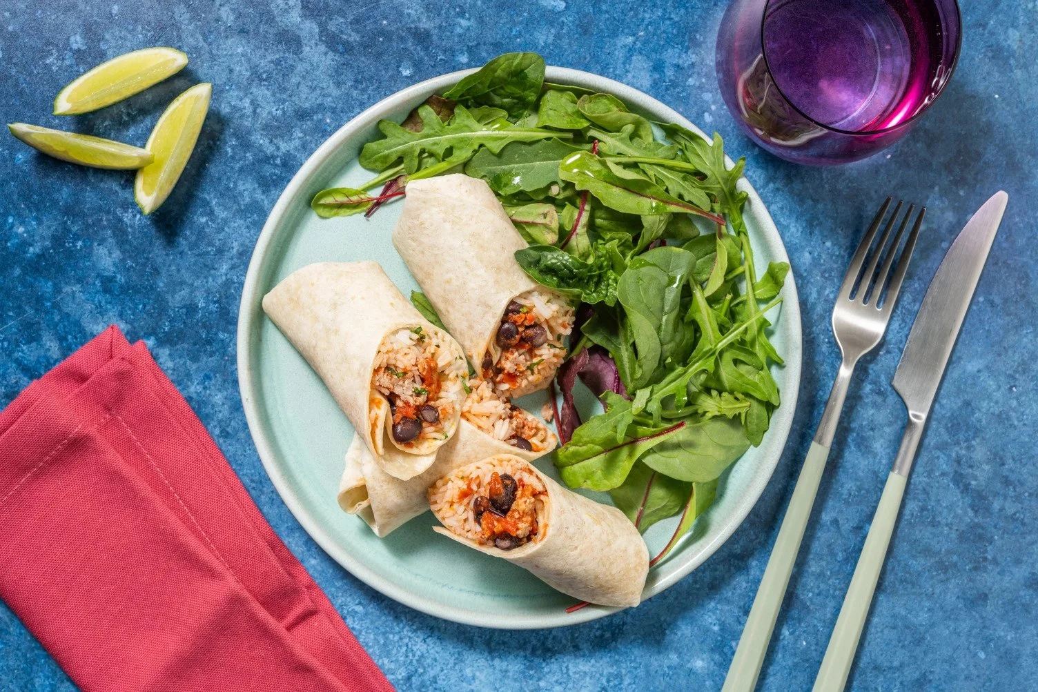 Burrito with pork, cheddar cheese, and black beans with lemon cilantro rice