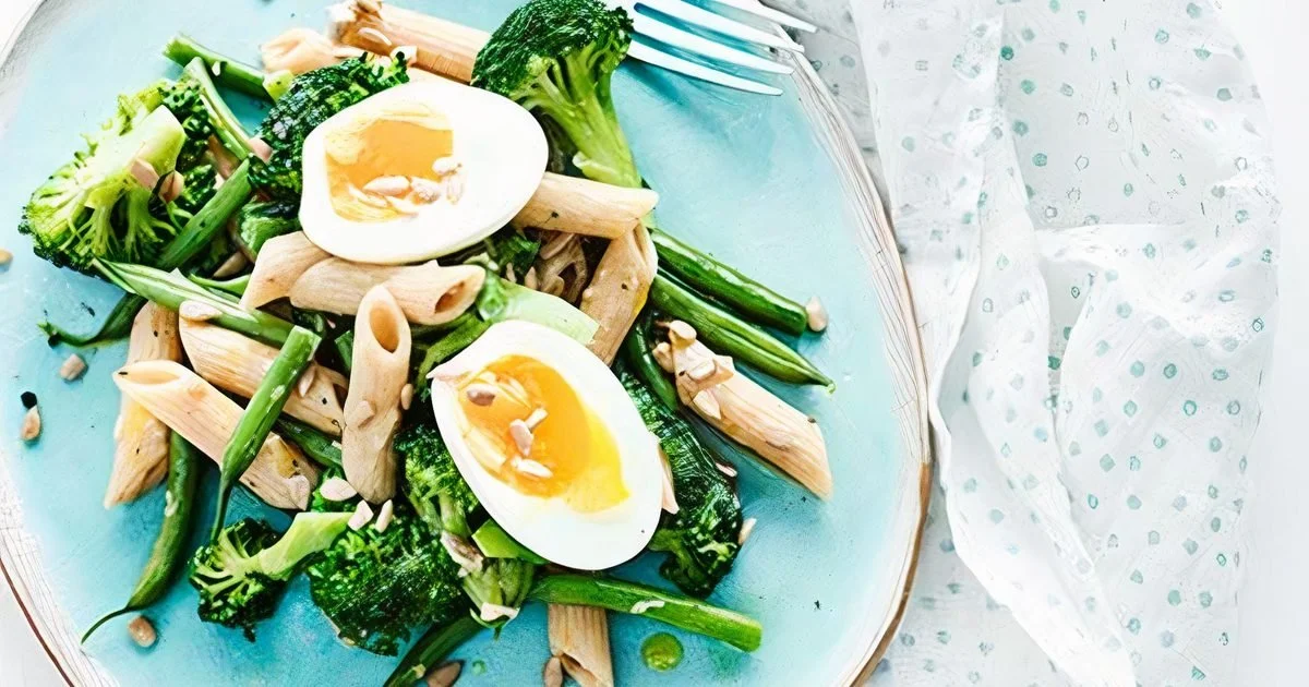 Pasta salad with broccoli, eggs, and sunflower seeds