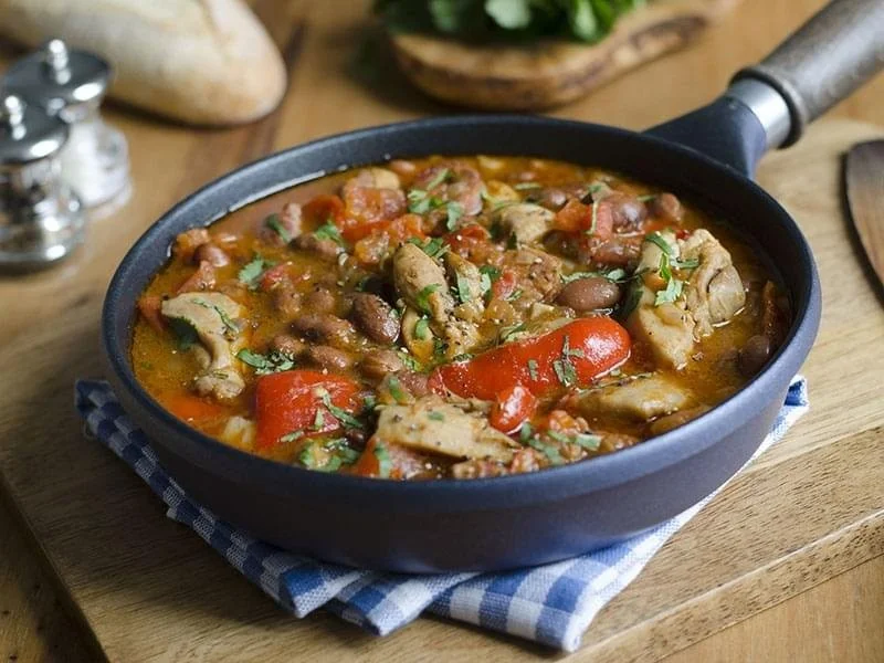 Stouffade de poulet aux agrumes et poivrons